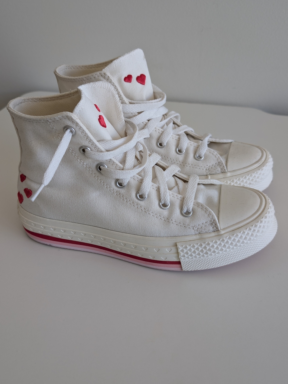 Converse White High-Top Sneakers with Pink Heart Details